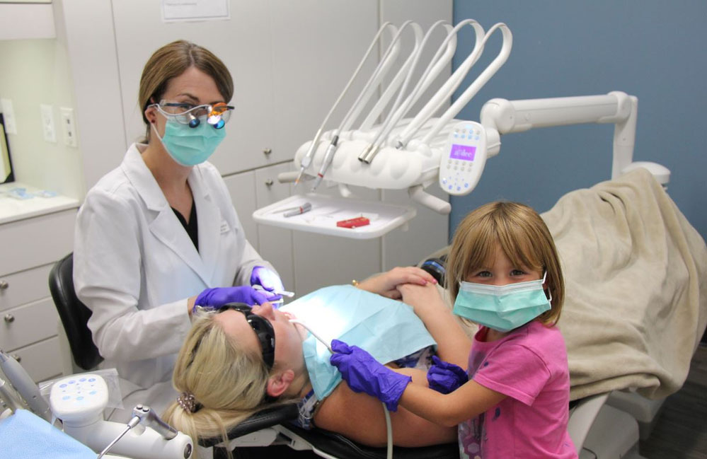 children Dr. Ponsford and her young assistant taking care of mom