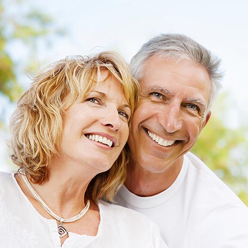 mature-couple-with-white-teeth multi generational family